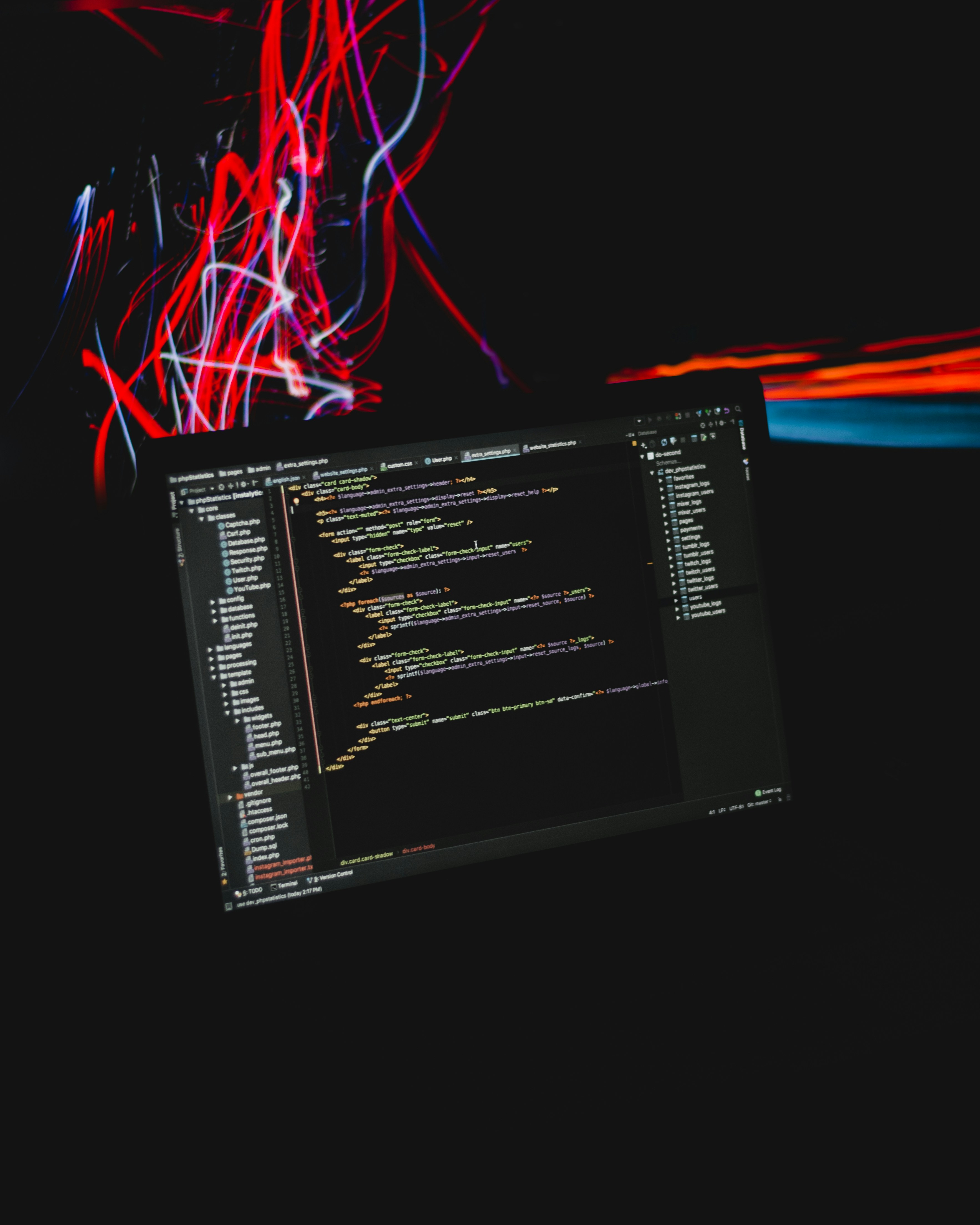 A computer screen with bespoke software development code on it