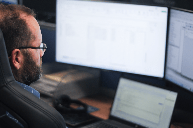 One of PSP IT's senior business analysts (BA) processing a technical audit 